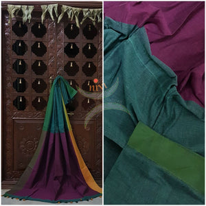 Teal Handloom linen saree with contrast border and pallu.