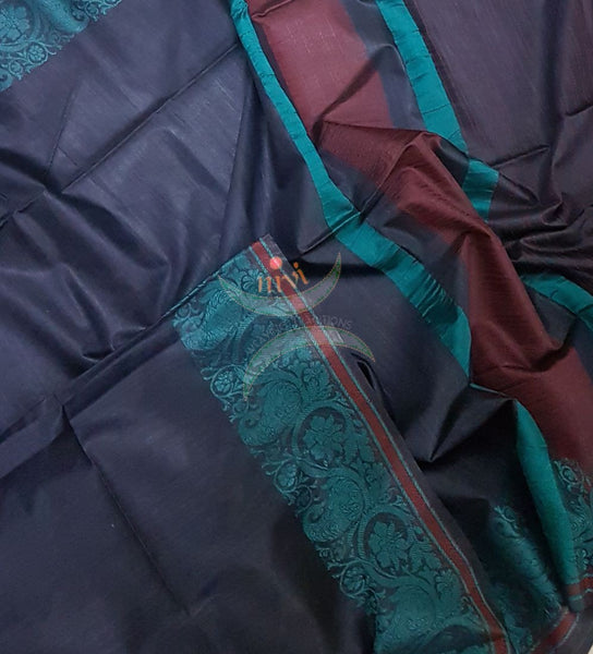 Dark grey with blue handloom cotton saree with traditional paisley woven border and striped pallu.