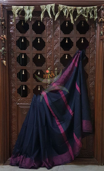 Navy blue with pink handloom cotton saree with traditional paisley woven border and striped pallu.
