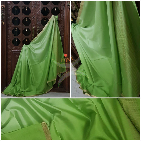 Pista Green 50 gms Two Tone waterproof pure Silk Crepe with a fine zari border. Saree comes with pure pista green crepe blouse in darker tone.