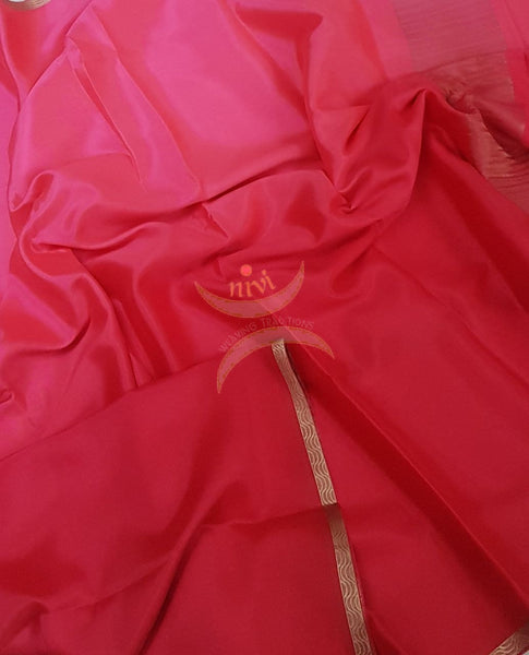 Pink 50 gms Two Tone waterproof pure Silk Crepe with a fine zari border. Saree comes with pure pink crepe blouse in darker tone.