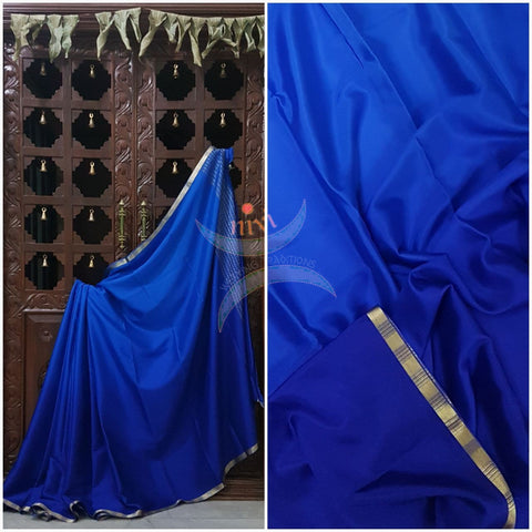 Royal blue 50 gms Two Tone waterproof pure Silk Crepe with a fine zari border. Saree comes with pure Royal blue crepe blouse in darker tone.