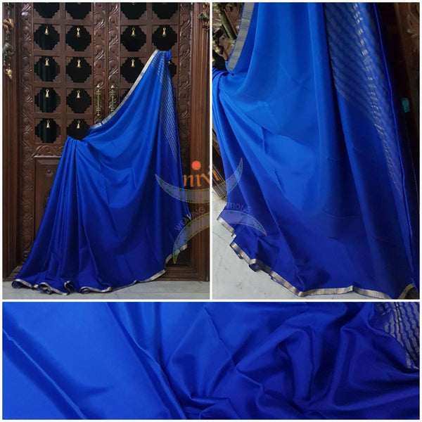 Royal blue 50 gms Two Tone waterproof pure Silk Crepe with a fine zari border. Saree comes with pure Royal blue crepe blouse in darker tone.