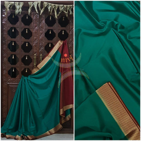Teal with maroon 60 grams waterproof pure mysore silk crepe with traditional border and striped pallu. Saree comes with plain maroon blouse matching pallu.