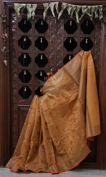 Mustard gold Linen Cotton Benaras Brocade saree with floral motifs and antique zari weaving all over the saree.