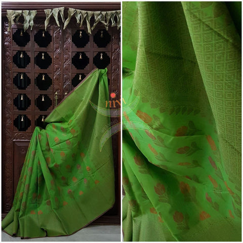 Green Linen cotton Benaras Brocade saree with antique zari weaving on the saree.