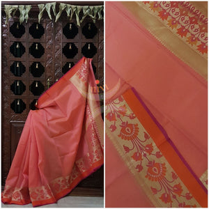 Peach silk Cotton Brocade saree with floral motifs woven on border and on the pallu of the saree.