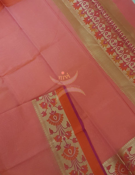 Peach silk Cotton Brocade saree with floral motifs woven on border and on the pallu of the saree.
