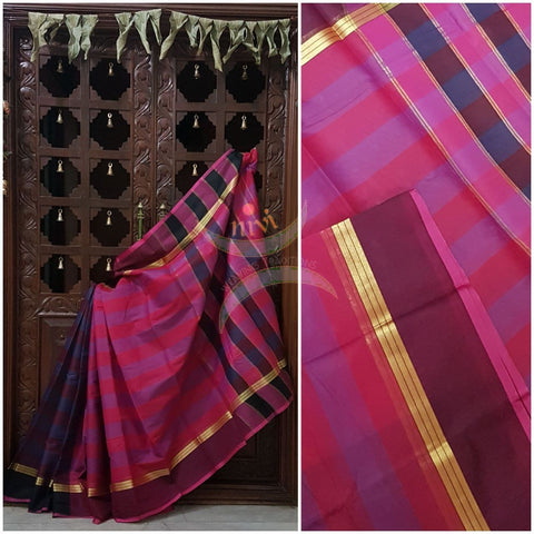 Pink with blue half and half cotton blended saree with contrasting maroon border and striped pallu.