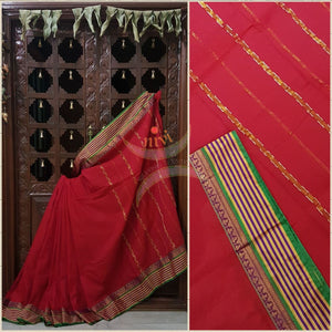 Red cotton blended saree with contrasting green border and striped pallu.