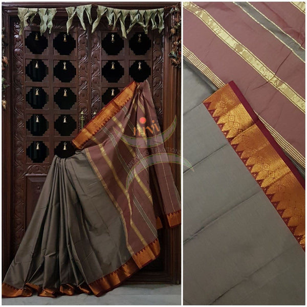Bronze grey merserised dharwad cotton with traditional maroon red border and striped pallu.