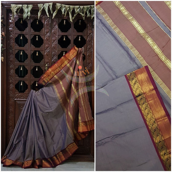 Grey with meganta merserised dharwad cotton with traditional meganta border and striped pallu.