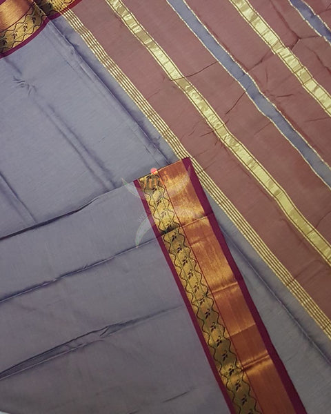 Grey with meganta merserised dharwad cotton with traditional meganta border and striped pallu.