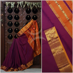 Meganta with orange merserised dharwad cotton with traditional orange border and striped pallu.
