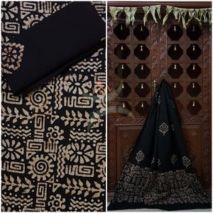 Black Batik printed three piece pure merserised  cotton suit.dress material is printed with abstract floral motif.