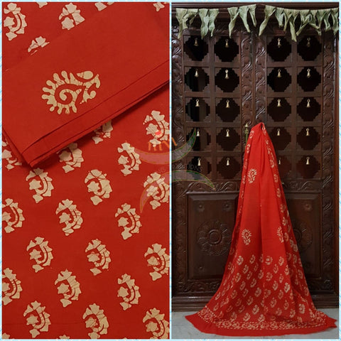 Red Batik printed three piece pure merserised cotton suit.dress material is printed with abstract floral motif.