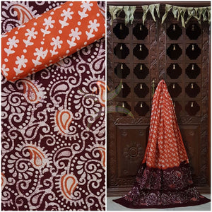 Brown with orange Batik printed three piece pure merserised cotton suit.dress material is printed with abstract paisley and floral motif.