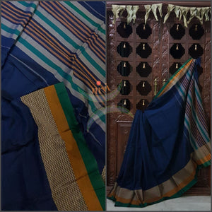 Royal blue with mustard green Eco friendly natural dyed soft organic cotton with mercerised finish. The saree has thread woven traditional border and  striped pallu.