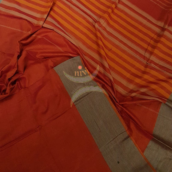 Orange Eco friendly natural dyed soft organic cotton with mercerised finish. The saree has thread woven traditional border and  striped pallu.