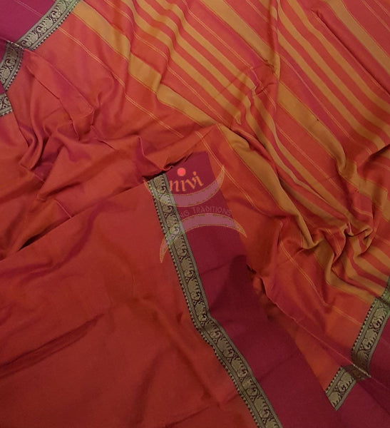 Peachish pink Eco friendly natural dyed soft organic cotton with mercerised finish. The saree has thread woven traditional border and  striped pallu.