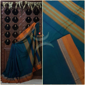 Teal with golden yellow Eco friendly natural dyed soft organic cotton with mercerised finish. The saree has thread woven traditional border and  striped pallu.