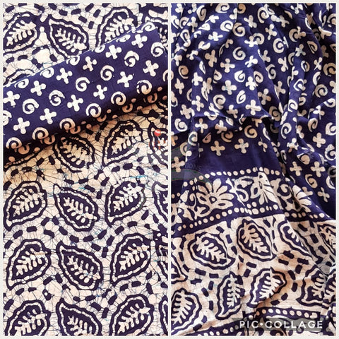 Off white with navy blue Batik printed three piece pure merserised cotton suit. Dress material is printed with abstract floral motif.