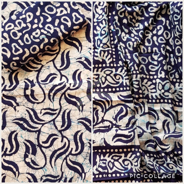 Off white with navy blue Batik printed three piece pure merserised cotton suit. Dress material is printed with abstract floral motif.