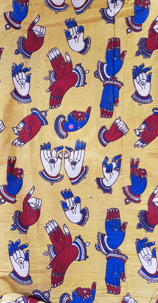 Yellow handloom cotton kalamkari with traditional hand mudra motifs. Width of the fabric is up to 43 inches.