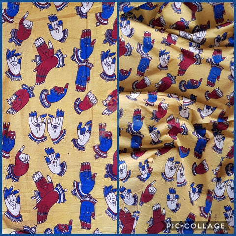 Yellow handloom cotton kalamkari with traditional hand mudra motifs. Width of the fabric is up to 43 inches.