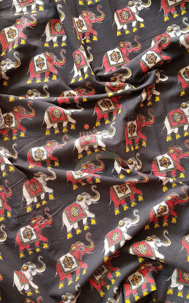 Black handloom cotton kalamkari with traditional Elephant motifs. Width of the fabric is up to 43 inches.