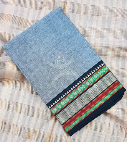 Grey with black mangalgiri pure cotton blouse piece with traditional woven border. The blouse piece comes with 42 inches by width and length up to 1mt.