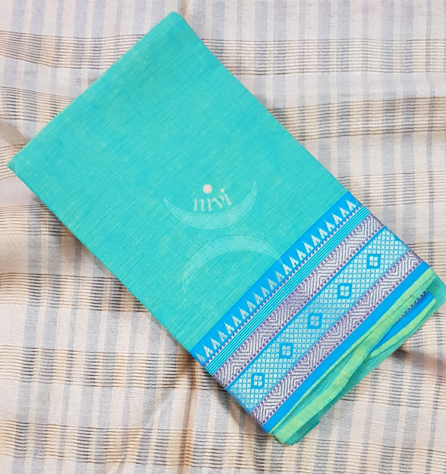 Sea green with blue Mangalgiri pure cotton blouse piece with traditional woven border. The blouse piece comes with 42 inches by width and length up to 1mt.
