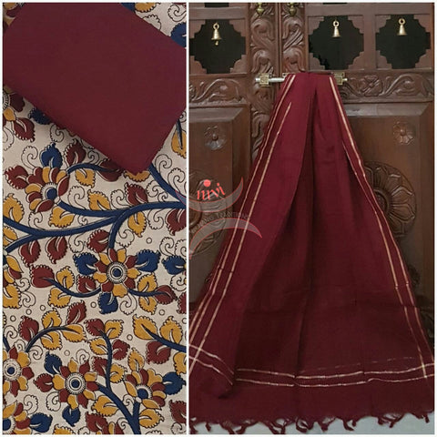 Off white handwoven kalamkari top with floral motif all over combined with maroon handwoven mangalgiri duppata and bottom