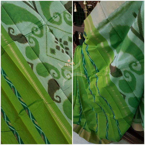 Green Pochampalli ikat merserised cotton saree with tissue border.