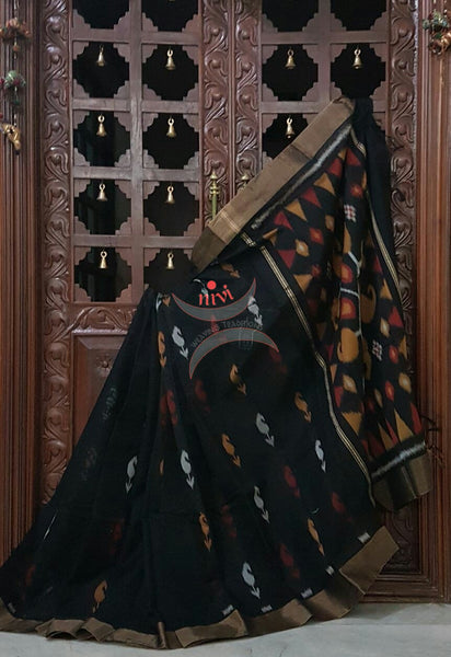 Black Pochampalli ikat merserised cotton saree with tissue border.