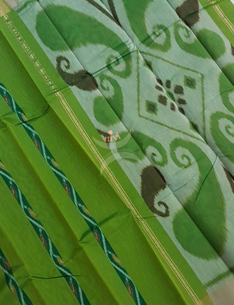 Green Pochampalli ikat merserised cotton saree with tissue border.