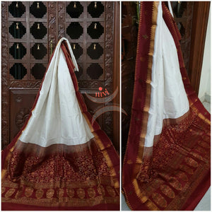 White with Maroon Handloom soft kanjivaram silk with Traditionally woven pallu and border.