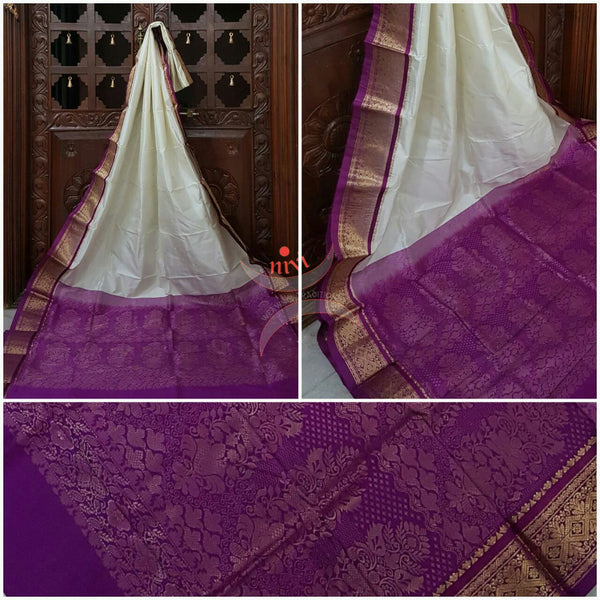 White with purple Handloom kanjivaram silk with Traditionally woven pallu and border.