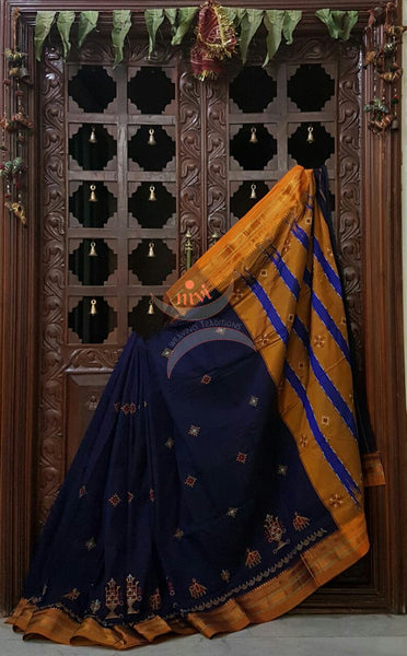 Royal blue with mustard silk cotton kasuti embroidered Ilkal with Anne ambari motif and traditional tope teni pallu . 