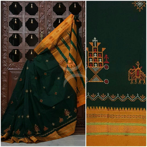Green with mustard silk cotton kasuti embroidered Ilkal with Anne ambari motif and traditional tope teni pallu . 