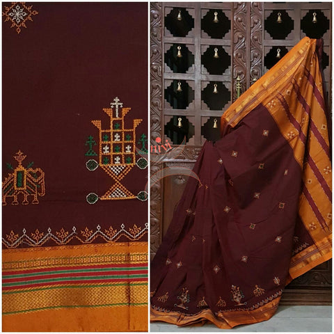 Maroon with mustard silk cotton kasuti embroidered Ilkal with Anne ambari motif and traditional tope teni pallu . 