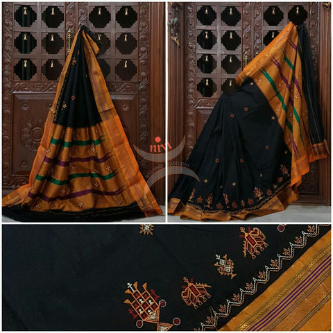 Black with mustard silk cotton kasuti embroidered Ilkal with Anne ambari motif and traditional tope teni pallu . 