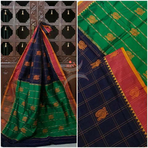 Royal blue with maroon and green sico traditional South saree with peacock motif allover the saree, border and pallu.