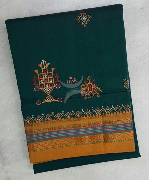 Teal with mustard silk cotton kasuti embroidered Ilkal with Anne ambari motif and traditional tope teni pallu . 