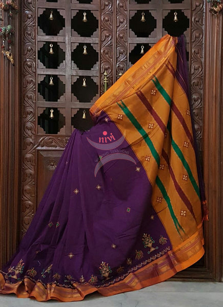Purple with mustard silk cotton kasuti embroidered Ilkal with Anne ambari  motif and traditional tope teni pallu . 