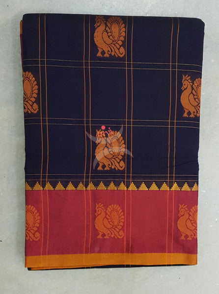 Royal blue with maroon and green sico traditional South saree with peacock motif allover the saree, border and pallu.