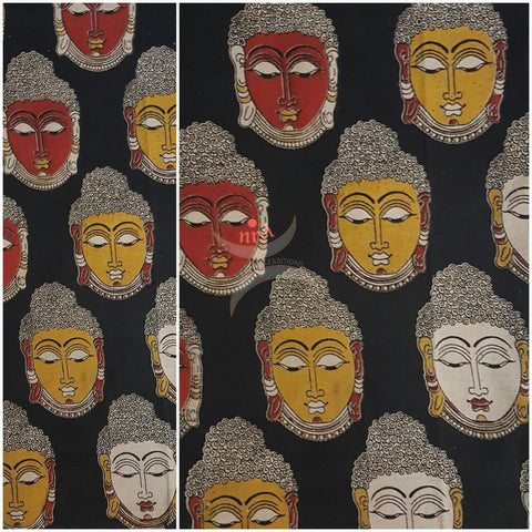 Black handwoven cotton kalamkari material with Buddha face motifs.