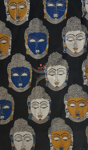 Black handwoven cotton kalamkari material with Buddha face motifs.