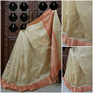 Cream silk cotton tussar saree with allover embroidery.