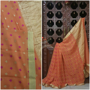 60 gram pure silk Georgette with floral booties and zari border.